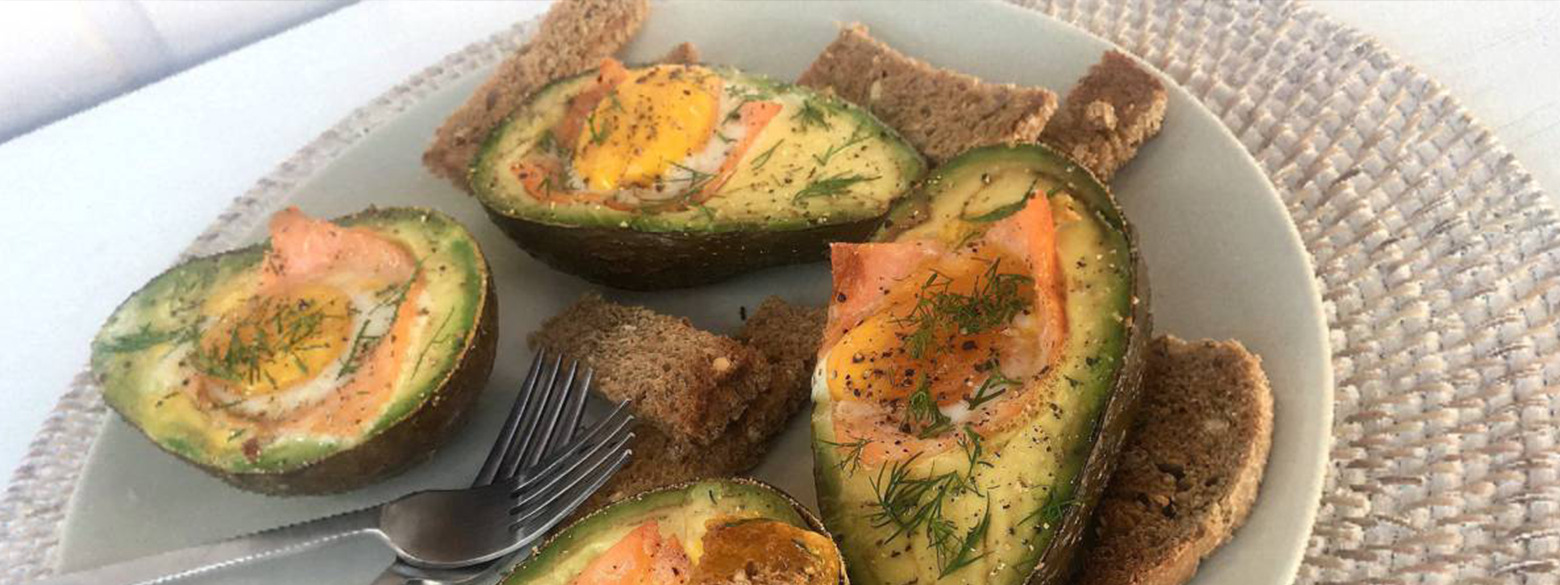 Breakfast of champs: stuffed avocado with salmon, egg, dill and wholegrain soldiers